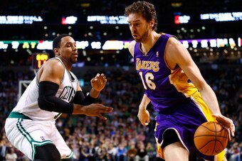 BOSTON, MA - JANUARY 17: Pau Gasol #16 of the Los Angeles Lakers drives to the basket past Jared Sullinger #7 of the Boston Celtics in the second half during the game at TD Garden on January 17, 2014 in Boston, Massachusetts. NOTE TO USER: User expressly BOSTON, MA - JANUARY 17: Pau Gasol #16 of the Los Angeles Lakers drives to the basket past Jared Sullinger #7 of the Boston Celtics in the second half during the game at TD Garden on January 17, 2014 in Boston, Massachusetts. NOTE TO USER: User expressly