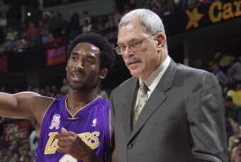21 Nov 2001:   Guard Kobe Bryant #8 and head coach Phil Jackson discuss the play preceding the end of the first half against the Denver Nuggets at the Pepsi Center in Denver, Colorado.    DIGITAL IMAGE    NOTE TO USER:  User expressly acknowledges and agr