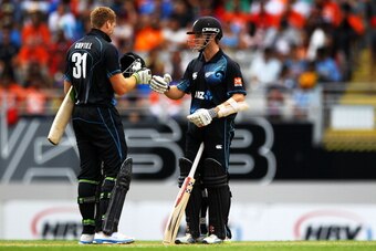 AUCKLAND, NEW ZEALAND - JANUARY 25: Kane Williamson and Martin Guptill of New Zealand paired up for 100 runs for New Zealand during the One Day International match between New Zealand and India at Eden Park on January 25, 2014 in Auckland, New Zealand. ( AUCKLAND, NEW ZEALAND - JANUARY 25: Kane Williamson and Martin Guptill of New Zealand paired up for 100 runs for New Zealand during the One Day International match between New Zealand and India at Eden Park on January 25, 2014 in Auckland, New Zealand. (