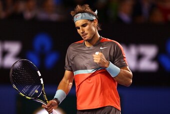 MELBOURNE, AUSTRALIA - JANUARY 24:  Rafael Nadal of Spain celebrates a break in serve in his semifinal match against Roger Federer of Switzerland during day 12 of the 2014 Australian Open at Melbourne Park on January 24, 2014 in Melbourne, Australia.  (Ph