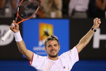 MELBOURNE, AUSTRALIA - JANUARY 26:  Stanislas Wawrinka of Switzerland celebrates winning championship point in his men's final match against Rafael Nadal of Spain during day 14 of the 2014 Australian Open at Melbourne Park on January 26, 2014 in Melbourne