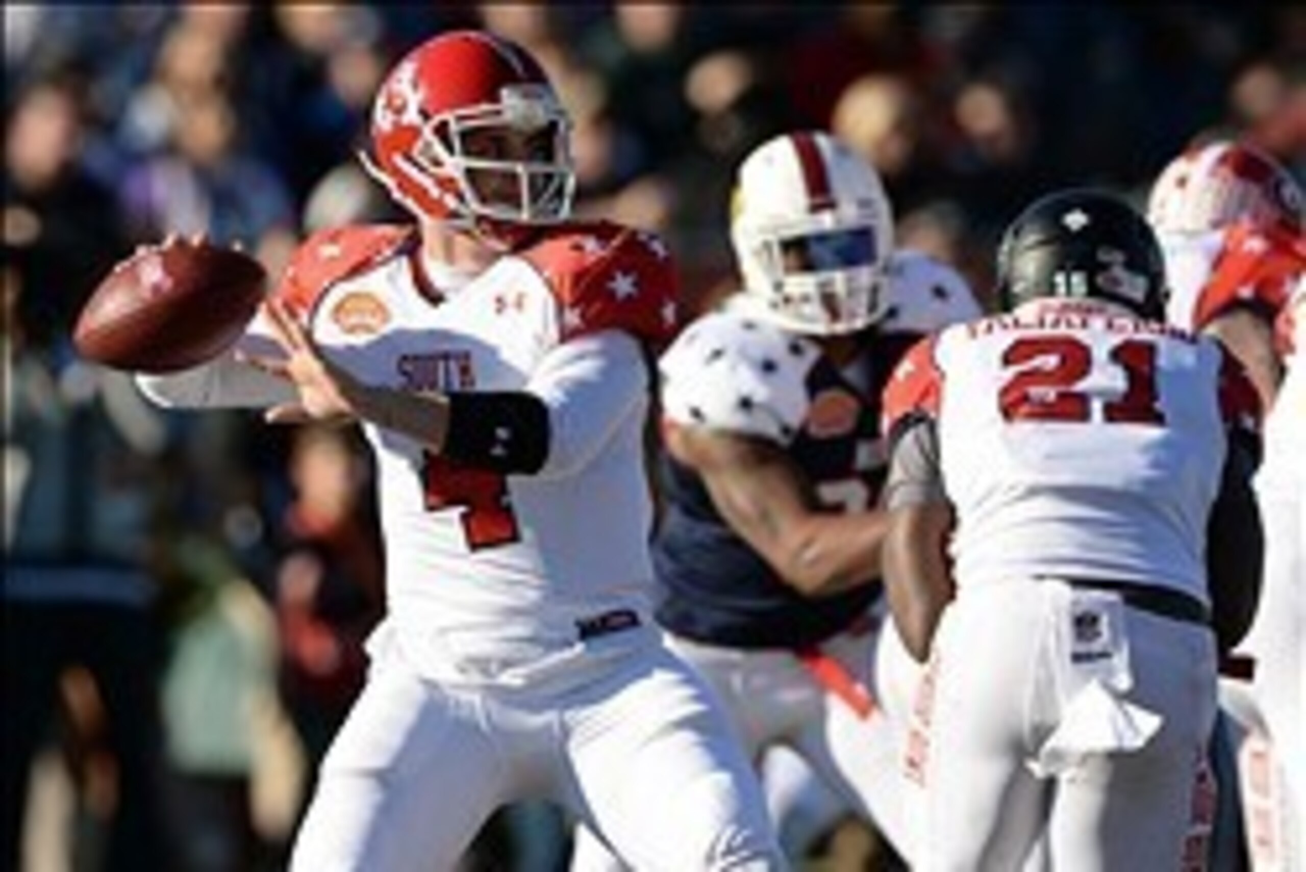 Jan 25, 2014; Mobile, AL, USA; South squad quarterback Derek Carr of Fresno State (4) drops back to pass against the North squad during the first quarter at Ladd-Peebles Stadium. Mandatory Credit: John David Mercer-USA TODAY Sports