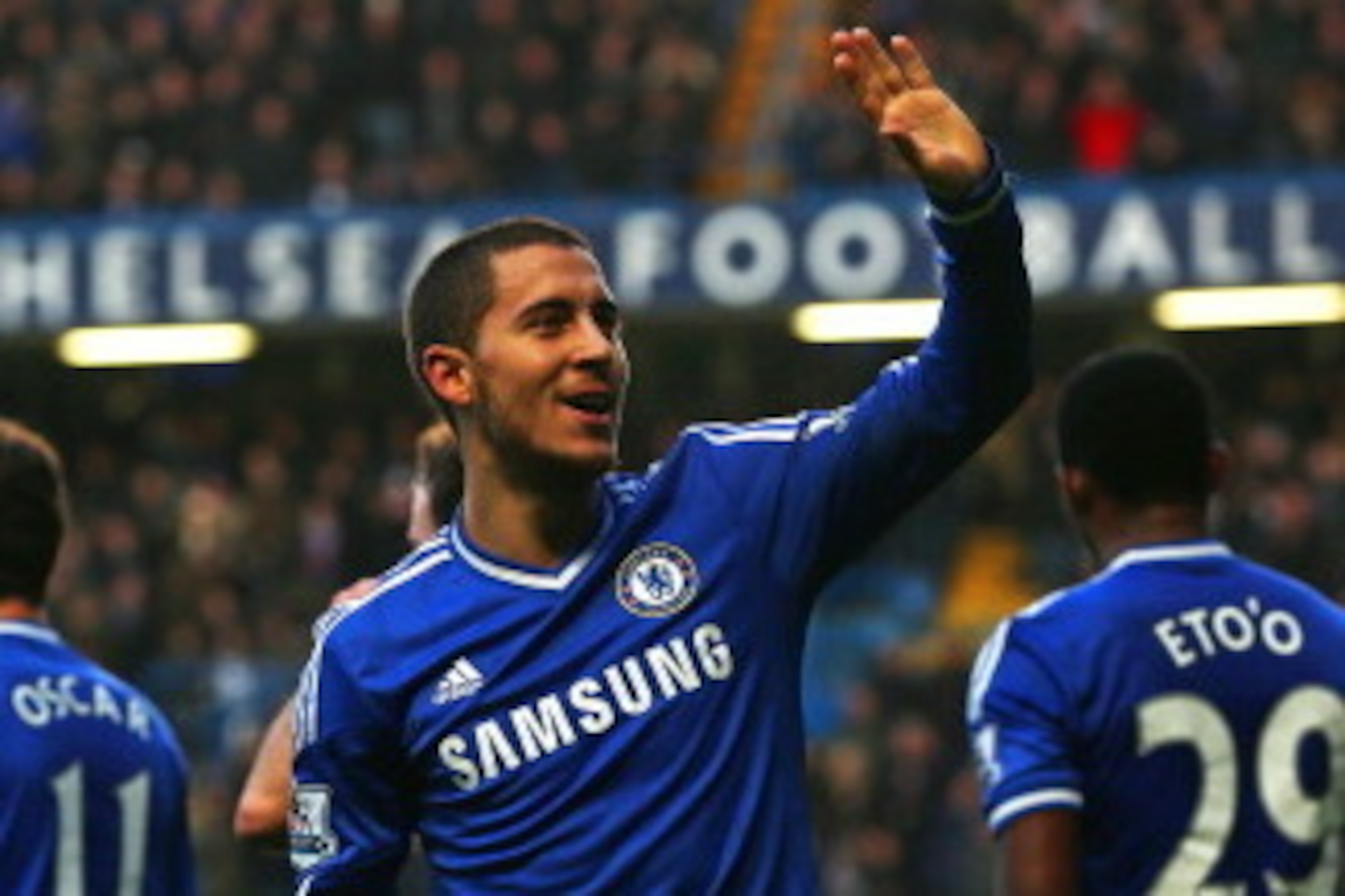 LONDON, ENGLAND - DECEMBER 26:  Eden Hazard of Chelsea celebrates scoring the first goal during the Barclays Premier League match between Chelsea and Swansea City at Stamford Bridge on December 26, 2013 in London, England.  (Photo by Warren Little/Getty I