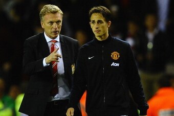 SUNDERLAND, ENGLAND - OCTOBER 05:  David Moyes of Manchester United talks with Adnan Januzaj after victory in the Barclays Premier League match between Sunderland and Manchester United at Stadium of Light on October 5, 2013 in Sunderland, England.  (Photo
