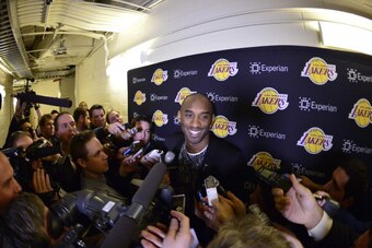 NEW YORK, NY - JANUARY 26: Kobe Bryant #24 of the Los Angeles Lakers speaks with the media after to the game against the New York Knicks at Madison Square Garden on January 26, 2014 in New York, New York. NOTE TO USER: User expressly acknowledges and agre