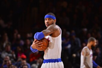 NEW YORK - JANUARY 24: Carmelo Anthony #7 of the New York Knicks looks on during the game against the Charlotte Bobcats on January 24, 2014 at Madison Square Garden in New York City. NOTE TO USER: User expressly acknowledges and agrees that, by downloadin