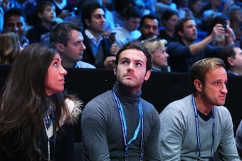 LONDON, ENGLAND - NOVEMBER 10:  Footballer Juan Mata of Chelsea watches the semi-final match between Rafael Nadal of Spain and Roger Federer of Switzerland during day seven of the Barclays ATP World Tour Finals at O2 Arena on November 10, 2013 in London,