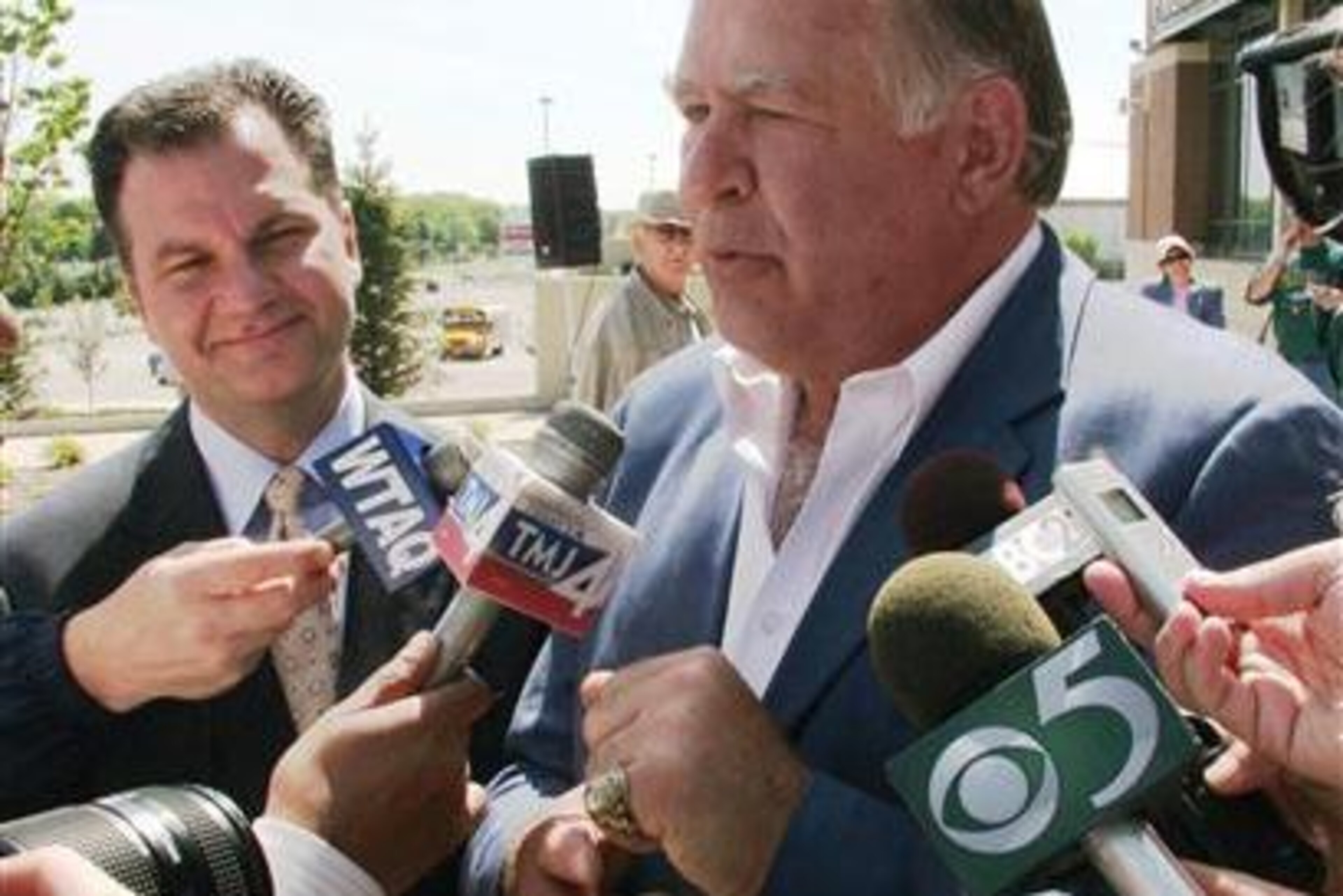 Jerry Kramer talks to reporters after the return of his Super Bowl I ring.