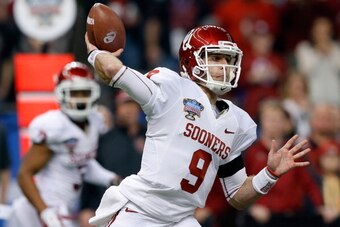 NEW ORLEANS, LA - JANUARY 02:  Trevor Knight #9 of the Oklahoma Sooners throws a pass against the Alabama Crimson Tide during the Allstate Sugar Bowl at the Mercedes-Benz Superdome on January 2, 2014 in New Orleans, Louisiana.  (Photo by Kevin C. Cox/Gett