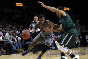 NEW YORK, NY - DECEMBER 28: Marcus Foster #2 of the Kansas State Wildcats drives to the basket against the Tulane Green Wave during the Brooklyn Hoops Winter Festival at Barclays Center on December 28, 2013 in the Brooklyn borough of New York City. (Photo