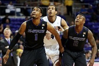 Jan 7, 2014; Fort Worth, TX, USA; Kansas State Wildcats guard Shane Southwell (1) and guard Marcus Foster (2) block out TCU Horned Frogs forward Amric Fields (4) during the first half at Daniel-Meyer Coliseum. Mandatory Credit: Kevin Jairaj-USA TODAY Spor