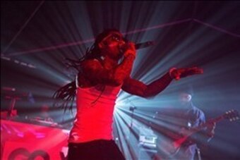 Feb. 2, 2013; New Orleans, LA, USA: Recording artist Lil Wayne performs during the GQ Party at the Elms Mansion leading up to Super Bowl XLVII. Mandatory Credit: Mark J. Rebilas-USA TODAY Sports
