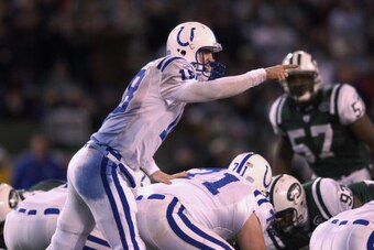 EAST RUTHERFORD, NJ - JANUARY 4:  Quarterback Peyton Manning #18 of the Indianapolis Colts yells the play at the line during the AFC Wildcard Game against the New York Jets  at Giant Stadium on January 4, 2003 in East Rutherford, New Jersey. The Jets won 