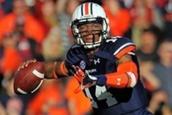 Nov 30, 2013; Auburn, AL, USA; Auburn Tigers quarterback Nick Marshall (14) throws against the Alabama Crimson Tide during the first quarter at Jordan Hare Stadium. Mandatory Credit: Shanna Lockwood-USA TODAY Sports