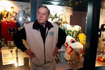 Larry Grantham with his No. 60 Jets jersey at the Mississippi Sports Hall of Fame.