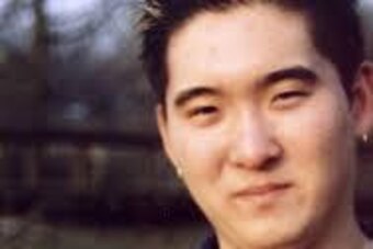 Phil Hong with Walter Payton's Super Bowl XX ring.