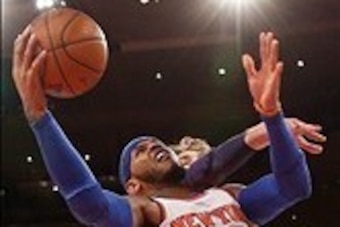 Jan 26, 2014; New York, NY, USA;  New York Knicks small forward Carmelo Anthony (7) shoots the ball as Los Angeles Lakers center Pau Gasol (16) defends during the fourth quarter at Madison Square Garden. The Knicks won 110-103. Mandatory Credit: Anthony G