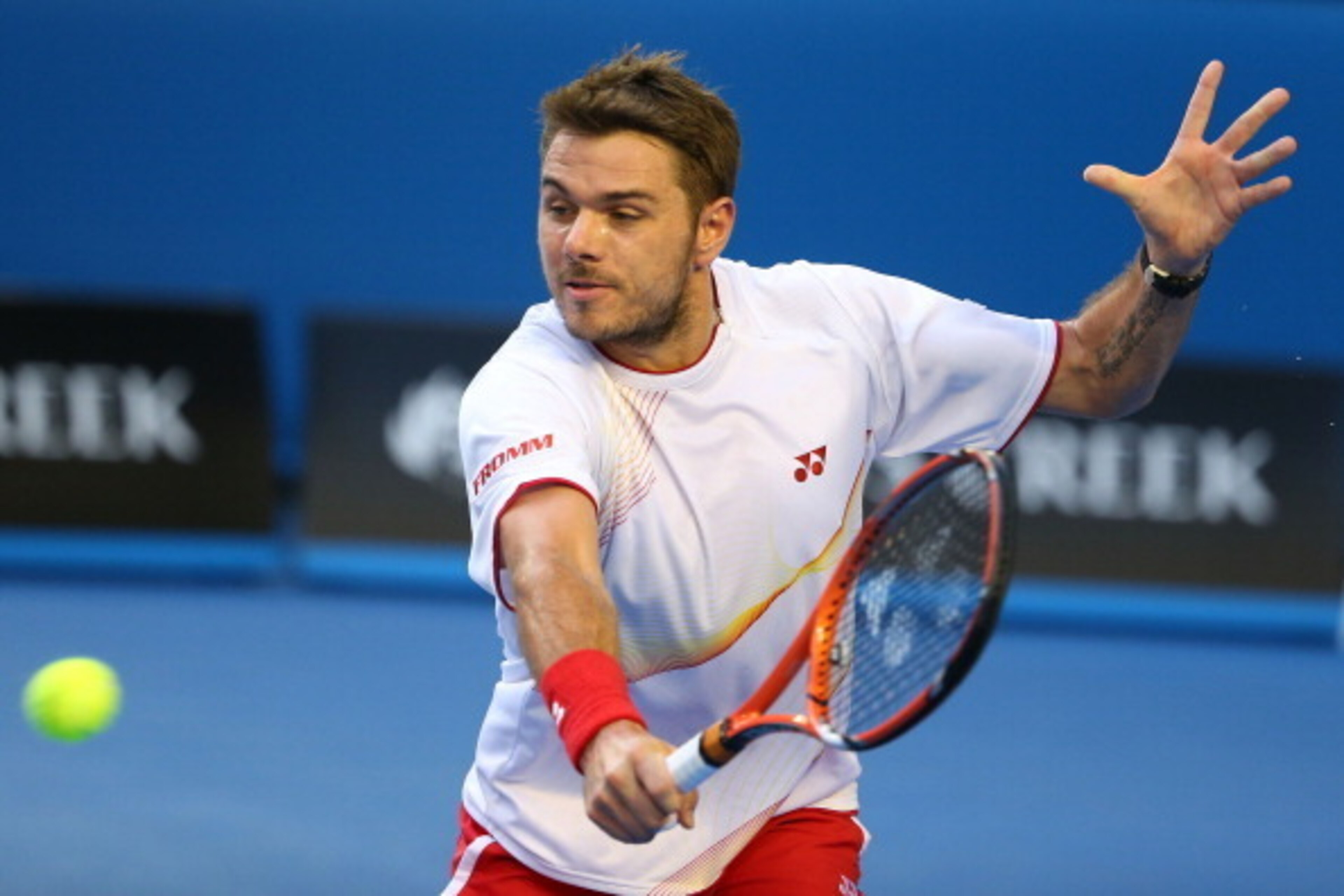 MELBOURNE, AUSTRALIA - JANUARY 23:  Stanislas Wawrinka of Switzerland plays a backhand in his semifinal match against Tomas Berdych of the Czech Republic during day 11 of the 2014 Australian Open at Melbourne Park on January 23, 2014 in Melbourne, Austral