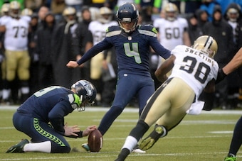 SEATTLE, WA - JANUARY 11:  Kicker Steven Hauschka #4 of the Seattle Seahawks makes a 24-yard field goal in the second quarter against the New Orleans Saints during the NFC Divisional Playoff Game at CenturyLink Field on January 11, 2014 in Seattle, Washin