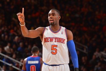 NEW YORK, NY - JANUARY 7: Tim Hardaway Jr. #5 of the New York Knicks directs his team during the game against the Detroit Pistons on January 7, 2014 at Madison Square Garden in New York City, New York. NOTE TO USER: User expressly acknowledges and agrees 