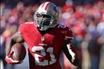 Nov 10, 2013; San Francisco, CA, USA; San Francisco 49ers running back Frank Gore (21) carries the ball against the Carolina Panthers during the second quarter at Candlestick Park. Mandatory Credit: Kelley L Cox-USA TODAY Sports