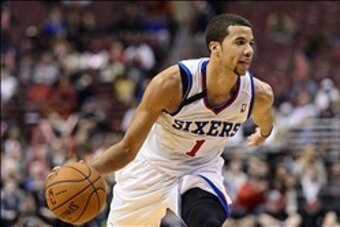 Dec 3, 2013; Philadelphia, PA, USA; Philadelphia 76ers guard Michael Carter-Williams (1) during overtime against the Orlando Magic at the Wells Fargo Center. The Sixers defeated the Magic 126-125 in double overtime. Mandatory Credit: Howard Smith-USA TODA