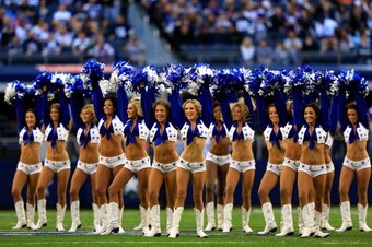 ARLINGTON, TX - NOVEMBER 03:  The Dallas Cowboys cheerleaders perform prior to the start of the game against the Minnesota Vikings at Cowboys Stadium on November 3, 2013 in Arlington, Texas.  (Photo by Jamie Squire/Getty Images)