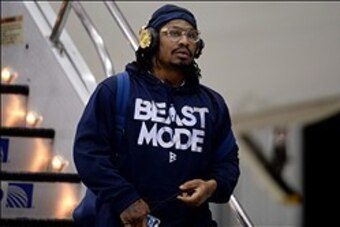 Jan 26, 2014; Newark, NJ, USA; Seattle Seahawks running back Marshawn Lynch arrives at Newark Liberty International Airport to face the Denver Broncos in Super Bowl XLVIII. Mandatory Credit: Joe Camporeale-USA TODAY Sports