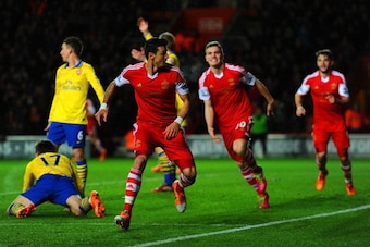 SOUTHAMPTON, ENGLAND - JANUARY 28: Jose Fonte of Southampton turns to celebrate scoring the opening goal during the Barclays Premier League match between Southampton and Arsenal at St Mary's Stadium on January 28, 2014 in Southampton, England.  (Photo by 