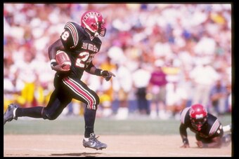 5 Sep 1992:  Running back Marshall Faulk of the San Diego State Aztecs runs down the field during a game against the USC Trojans at Jack Murphy Stadium in San Diego, California.  The teams tied at 31-31. Mandatory Credit: Mike Powell  /Allsport