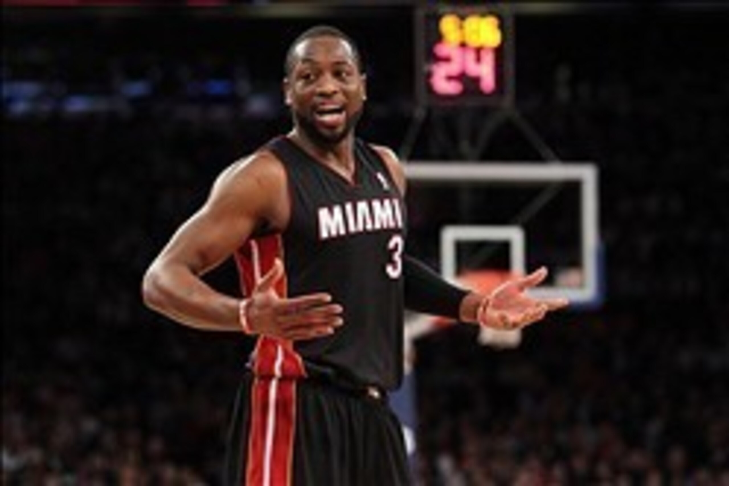 Jan 9, 2014; New York, NY, USA; Miami Heat shooting guard Dwyane Wade (3) responds to fans' taunting during the fourth quarter of a game against the New York Knicks at Madison Square Garden. Mandatory Credit: Brad Penner-USA TODAY Sports
