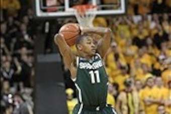 Jan 28, 2014; Iowa City, IA, USA; Michigan State Spartans guard Keith Appling (11) passes against the Iowa Hawkeyes during the first half at Carver-Hawkeye Arena. Mandatory Credit: Reese Strickland-USA TODAY Sports