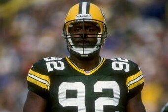25 Oct 1998: Reggie White #92 of the Green Bay Packers as he stands on the field during a game against the Baltimore Ravens at Lambeau Field in Green Bay, Wisconsin. The Packers defeated the Ravens 28-10. Mandatory Credit: Jonathan Daniel  /Allsport