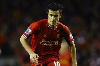 LIVERPOOL, ENGLAND - JANUARY 28: Philippe Coutinho of Liverpool in action during the Barclays Premier League match between Liverpool and Everton at Anfield on January 28, 2014 in Liverpool, England.  (Photo by Laurence Griffiths/Getty Images)