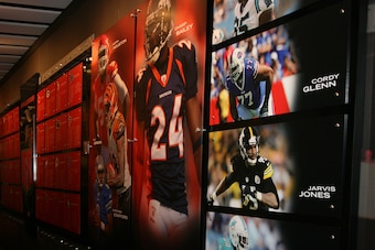 A wall of former Georgia players in the NFL lines the hallway leading to Georgia's offensive and defensive meeting rooms