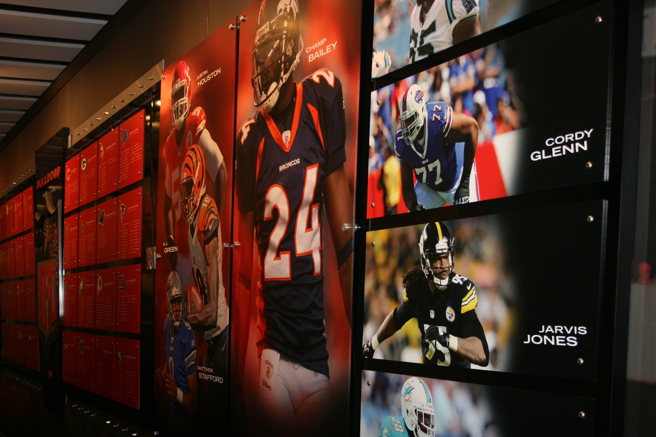 A wall of former Georgia players in the NFL lines the hallway leading to Georgia's offensive and defensive meeting rooms