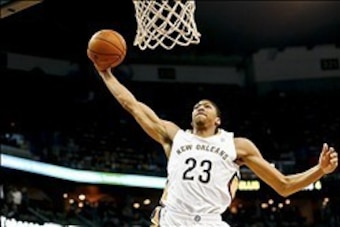 Jan 10, 2014; New Orleans, LA, USA; New Orleans Pelicans power forward Anthony Davis (23) dunks against the Dallas Mavericks during the first quarter of a game at New Orleans Arena. Mandatory Credit: Derick E. Hingle-USA TODAY Sports