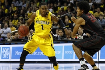 NEW YORK, NY - DECEMBER 21:  Glenn Robinson III #1 of the Michigan Wolverines drives against Josh Huestis #24 of the Stanford Cardinals during the Brooklyn Hoops Holiday Invitational at Barclays Center on December 21, 2013 in the Brooklyn borough of New Y