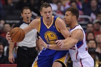 Oct 31, 2013; Los Angeles, CA, USA;   Los Angeles Clippers power forward Blake Griffin (32) guards Golden State Warriors power forward David Lee (10) in the first half of the game at Staples Center.Clippers won 125-115. Mandatory Credit: Jayne Kamin-Oncea