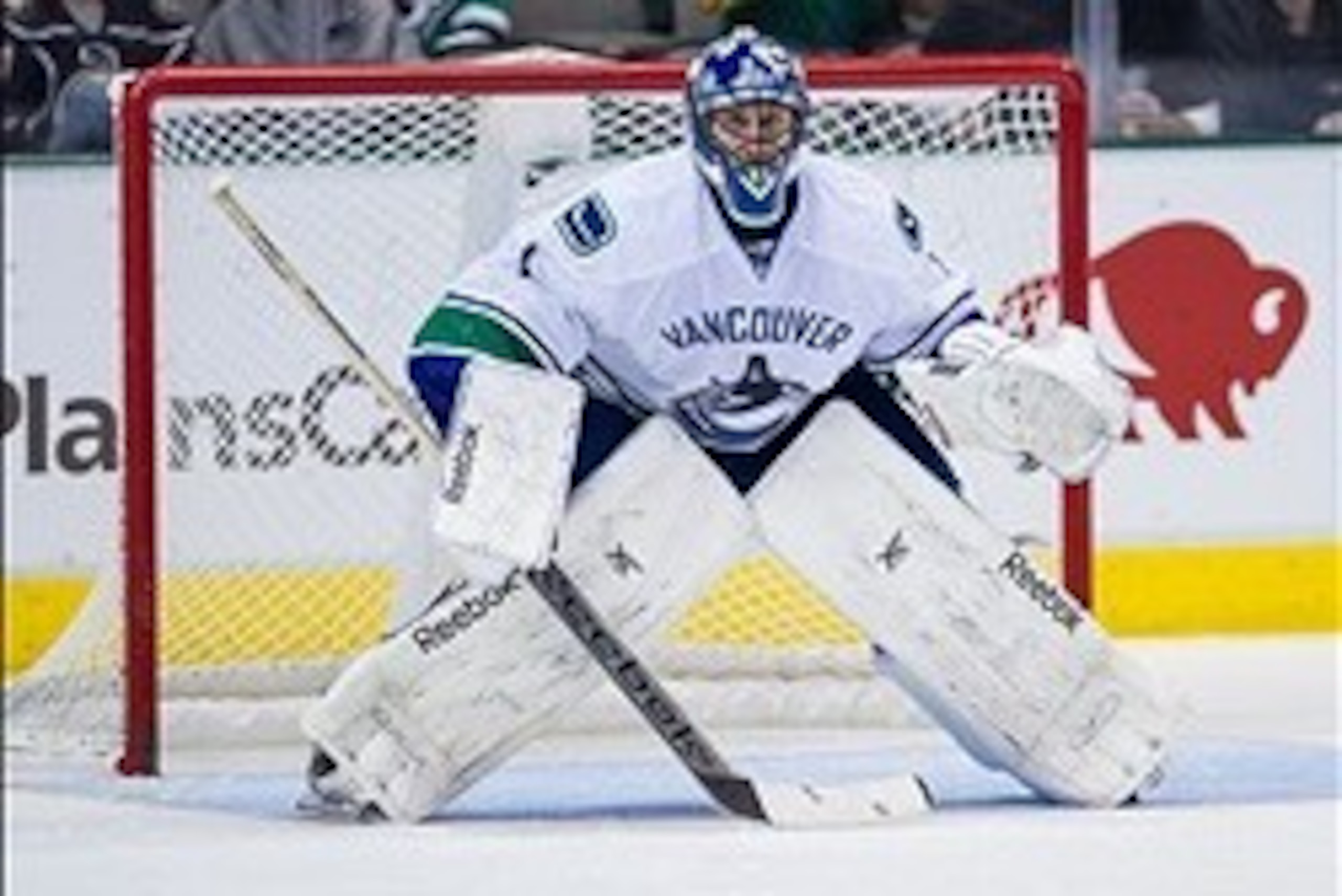 Dec 19, 2013; Dallas, TX, USA; Vancouver Canucks goalie Roberto Luongo (1) defends against the Dallas Stars attack during the game at the American Airlines Center. The Dallas Stars defeated the Vancouver Canucks 4-1. Mandatory Credit: Jerome Miron-USA TO Dec 19, 2013; Dallas, TX, USA; Vancouver Canucks goalie Roberto Luongo (1) defends against the Dallas Stars attack during the game at the American Airlines Center. The Dallas Stars defeated the Vancouver Canucks 4-1. Mandatory Credit: Jerome Miron-USA TO