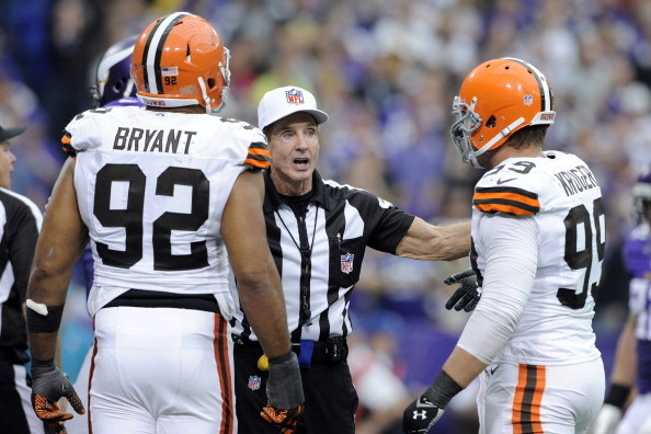 MINNEAPOLIS, MN - SEPTEMBER 22: Desmond Bryant #92 and Paul Kruger #99 of the Cleveland Browns speak with referee Bill Leavy #127 during the game against the Minnesota Vikings on September 22, 2013 at Mall of America Field at the Hubert H. Humphrey Metrod