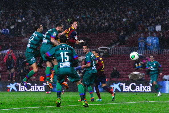 BARCELONA, SPAIN - JANUARY 29:  Carles Puyol of FC Barcelona scores his team's second goal during the Copa del Rey Quarter Final 2nd leg match between FC Barcelona and Levante U.D Camp Nou on January 29, 2014 in Barcelona, Spain.  (Photo by David Ramos/Ge