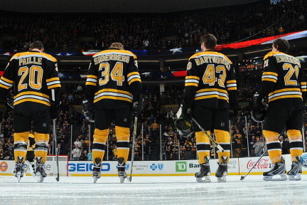BOSTON, MA - JANUARY 28: Johnny Boychuk #55, Daniel Paille #20, Carl Soderberg #34, Matt Bartkowski #43 and Loui Eriksson #21 of of the Boston Bruins stand on the ice as the starting line up against the Florida Panthers at the TD Garden on January 28, 201