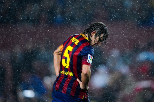 BARCELONA, SPAIN - JANUARY 29:  Carles Puyol of FC Barcelona looks rejected during the Copa del Rey Quarter Final 2nd leg match between FC Barcelona and Levante U.D Camp Nou on January 29, 2014 in Barcelona, Spain.  (Photo by David Ramos/Getty Images)