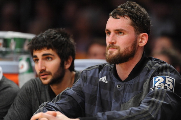 LOS ANGELES, CA - DECEMBER 20: Ricky Rubio #9 and Kevin Love #42 of the Minnesota Timberwolves look on from the bench during a game against the Los Angeles Lakers at Staples Center on December 20, 2013 in Los Angeles, California. NOTE TO USER: User expres