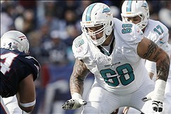 Oct 27, 2013; Foxborough, MA, USA; Miami Dolphins guard Richie Incognito (68) prepares to block against the New England Patriots during the second quarter at Gillette Stadium. Mandatory Credit: Winslow Townson-USA TODAY Sports
