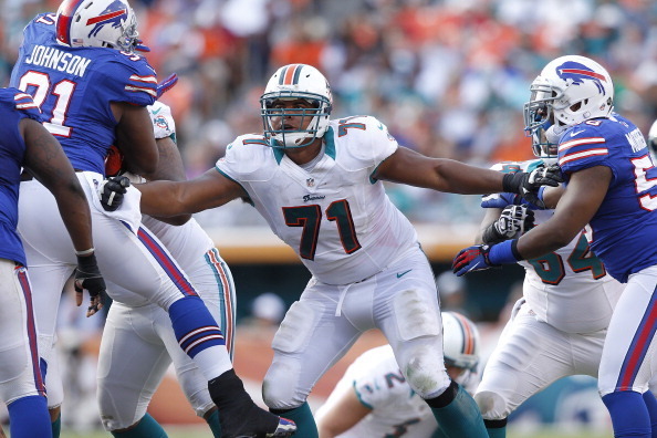 MIAMI GARDENS, FL - DECEMBER 23: Jonathan Martin #71 of the Miami Dolphins defends along the line against the Buffalo Bills on December 23, 2012 at Sun Life Stadium in Miami Gardens, Florida. The Dolphins defeated the Bills 24-10. (Photo by Joel Auerbach/