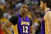 Apr 10, 2013; Portland, OR, USA; Los Angeles Lakers center Dwight Howard (12) and power forward Pau Gasol (16) react to a foul call against the Portland Trail Blazers at the Rose Garden. Mandatory Credit: Craig Mitchelldyer-USA TODAY Sports