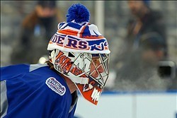 Jan 28, 2014; Bronx, NY, USA; New York Islanders goalie Evgeni Nabokov (20) during practice the day before the Stadium Series hockey game at Yankee Stadium. Mandatory Credit: Ed Mulholland-USA TODAY Sports