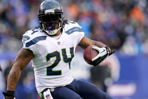 EAST RUTHERFORD, NJ - DECEMBER 15: Marshawn Lynch #24 of the Seattle Seahawks carries the ball in the third quarter against the New York Giants at MetLife Stadium on December 15, 2013 in East Rutherford, New Jersey.The Seattle Seahawks defeated the New Yo